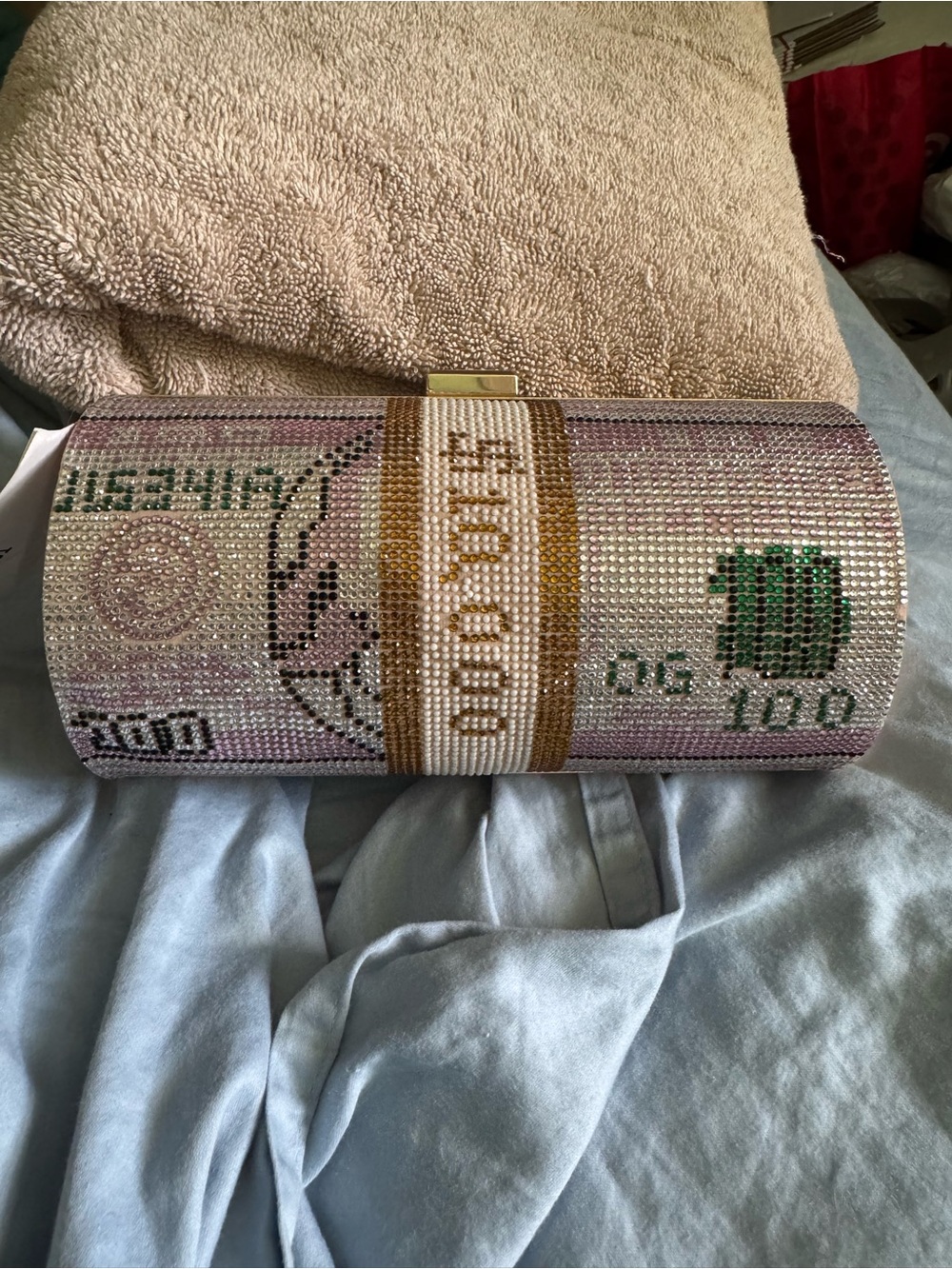 Crystal-Encrusted Pink Money Roll Clutch